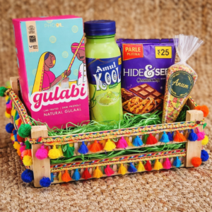 Holi gift hamper in pine wood box with gulal, thandai, cookies and candle